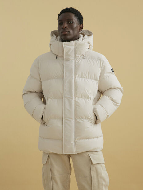 Mid-lenght hooded padded Dupont Sorona® quilted waterproof jacket